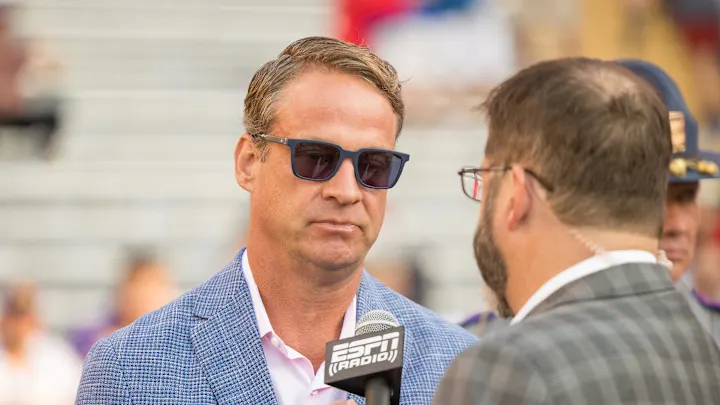 Ole Miss football coach Lane Kiffin welcomes Kevin Costner to Oxford